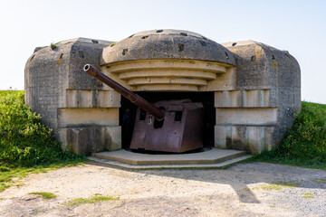 A bunker holding a 150 mm gun in the Longues-sur-Mer battery in Normandy, France, a WWII German coastal artillery battery part of the Atlantic Wall fortifications.
