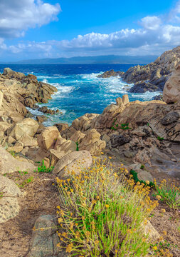 Corse (France) - Corsica is a big touristic french island in Mediterranean Sea, with beautiful beachs and mountains. Here a view of the Sentier du littoral from Campomoro