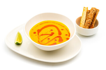 Strained lentil soup on a white porcelain plate