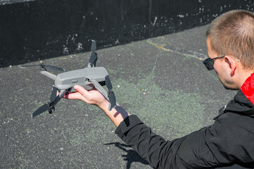 Man operating drone. Drone Pilot.
