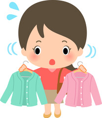 手に持った色違いの洋服を見比べている女性