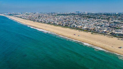 Manhattan Beach, Los Angeles, California, USA - 23-10-1, aerial landscape view of Manhattan Beach at South Bay with people walking on the beach - obrazy, fototapety, plakaty