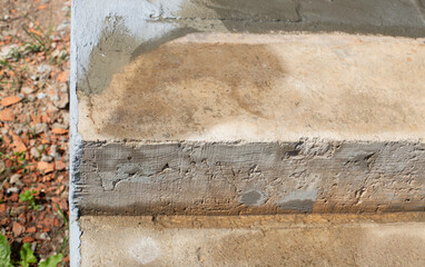 Restoration of concrete steps. The porch is made of concrete.