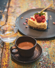 coffee cake and a glass of water in a cafe