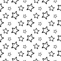 Seamless background with hand drawn stars on white. Christmas or New Year pattern. Festive wrap