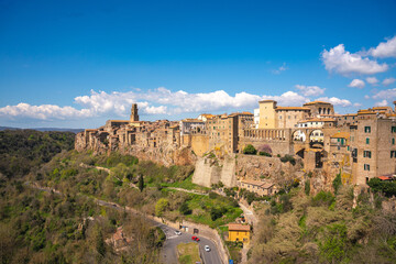 Beautiful scenery of the medieval city of Pitigliano, Italy - obrazy, fototapety, plakaty