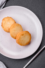 Delicious fresh sweet cheese pancakes with raisins and cinnamon