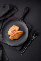 Delicious fried cutlets or meatballs with salt, spices and herbs