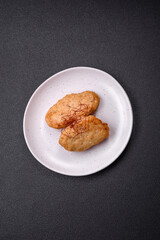 Delicious fried cutlets or meatballs with salt, spices and herbs