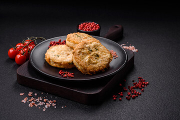 Delicious fried minced fish cutlets or meatballs with salt, spices and herbs