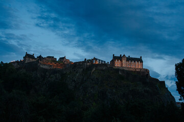 Fototapeta na wymiar Edinburgh Castle at Night - Medieval Fortress Nestled in Scenic Cityscape with Panoramic Skyline
