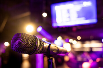 Karaoke microphone ready on a stage - obrazy, fototapety, plakaty
