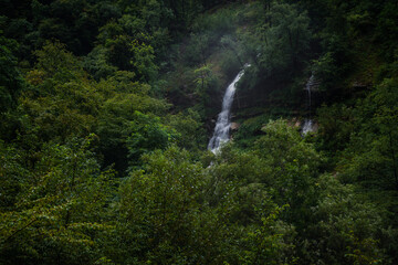 Amazing huge waterfall hidden deep in the forests of Triglav National park in Slovenia, Europe.