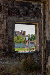the sports ground can be seen through the upper school