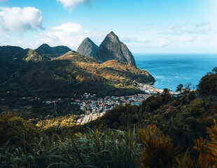 Soufriere, St Lucia from an overlook with the world famous Pitons in the background and beautiful...