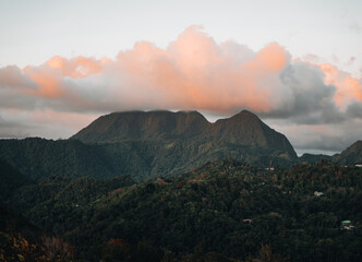 A view of the mountains from Petit and Gros Piton on St. Lucia in the Caribbean under blue skies. Photo taken near Soufriere.
