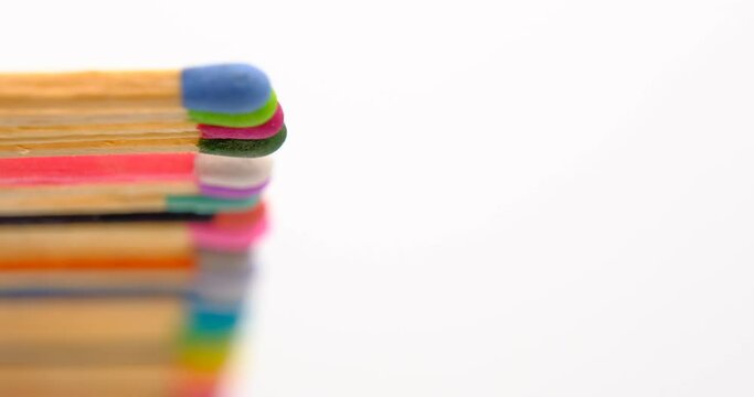 Still shot of colored matchsticks, with shallow depth of field and focus transition