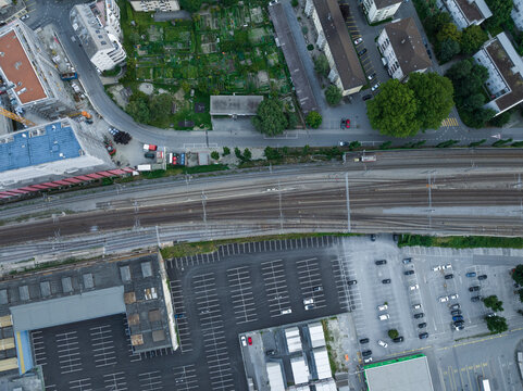 Aerial view of Visp railway near the train station, a small town among the Swiss Alps, Valais, Switzerland.