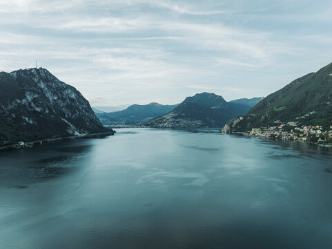 Aerial view of Lugano lake at sunset, Melide, Ticino, Switzerland.
