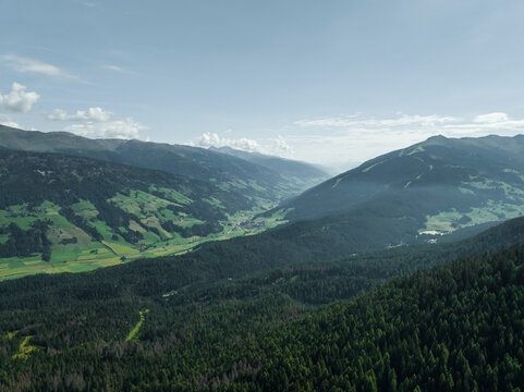 Aerial view of Versciaco town as seen from Croda dei Baranci (Birkenkofel) mountain peak on the Dolomites range, Trentino, South Tyrol, Italy.
