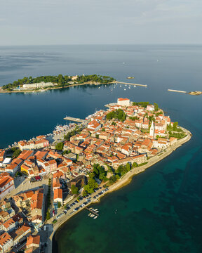 Aerial view of Porec and Otocic Sveti Nikola, a small island, a small town along the Adriatic Sea coastline in Istria, Croatia.
