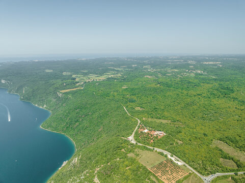 Aerial view of boats sailing along the Limski Fjord (Canal di Leme) in Sveti Lovrec, Istria, Croatia.