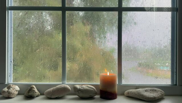 Rainy day view through house interior window