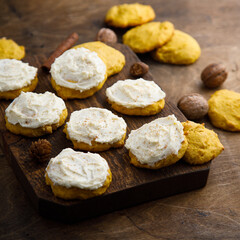 Homemade pumpkin cookies with walnut and cream cheese
