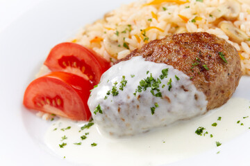 rice with cutlet and tomato