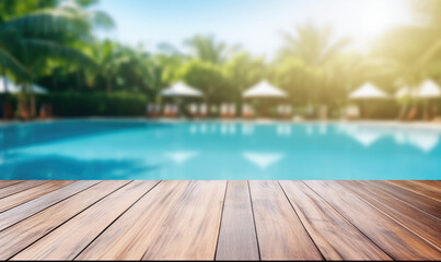 Fototapeta premium Empty wooden table with blurred swimming pool background. Table top product display showcase stage. Image ready for montage your text or product. 