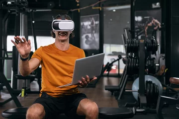 Poster de jardin Fitness Sport male using VR headset advance visual technology practise learning body fitness