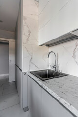 A wide angle view of contemporary modern kitchen idea design