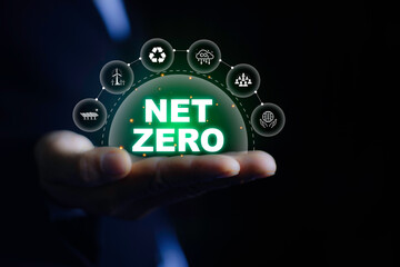 Net zero icon on businessman hand. Net zero for environmental, social, sustainable and ethical....