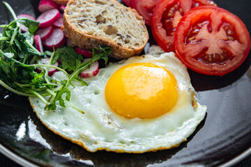 fried egg tasty breakfast fresh vegetables and toasted bread healthy eating cooking appetizer meal food snack on the table copy space