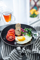 fried egg tasty breakfast fresh vegetables and toasted bread healthy eating cooking appetizer meal food snack on the table copy space