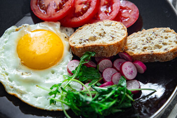 fried egg tasty breakfast fresh vegetables and toasted bread healthy eating cooking appetizer meal food snack on the table copy space