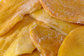 layers of dried mango on a white background studio shooting 1