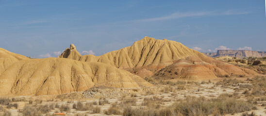 Strange rock formation out of sandstone and clay at desert landscape of the arid plateau of the Bardenas Reales, Arguedas, Navarra, Spain