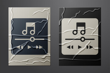 White Music player icon isolated on crumpled paper background. Portable music device. Paper art style. Vector