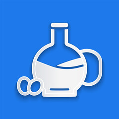 Paper cut Bottle of olive oil icon isolated on blue background. Jug with olive oil icon. Paper art style. Vector