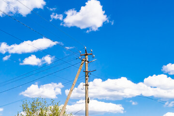 Power electric pole with line wire on colored background close up