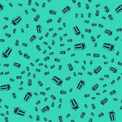 Black Popcorn in cardboard box icon isolated seamless pattern on green background. Popcorn bucket box. Vector