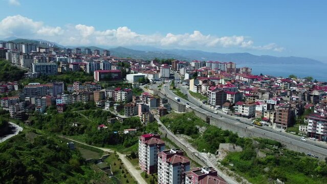 Overhead view of Trabzon, Turkey, capturing the cityscape and winding roads from above. Aerial shot.