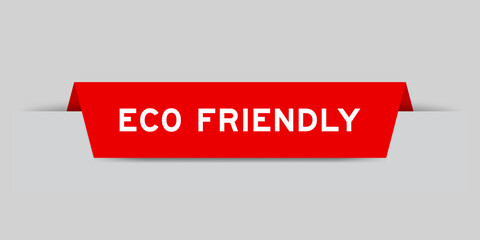 Red color inserted label with word eco friendly on gray background