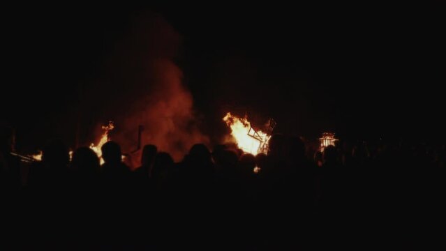 Gathering Of People And Big Fires