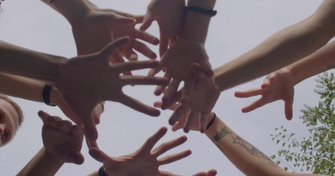 Team conducts a pre-game ritual as a means to enhance their collective spirit and unity. This ritual involves unique hand movements and gestures that hold significance for the team members. 