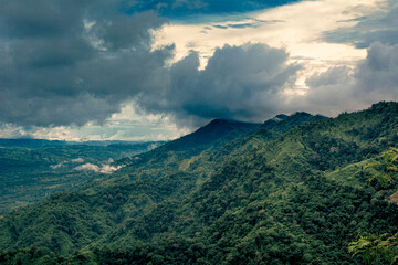 Dramatic Image Of Mountains With Cloudy Sky