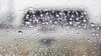 Rain drops on the glass create a shallow depth of field. for background work