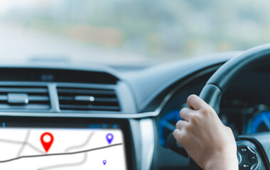 female hands, holding a steering wheel, car, driving a delivery, using a navigation device, through an online app, pinning goals, checking routes, practicing driving, testing, accident insurance.