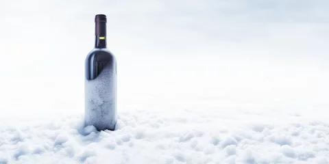Fotobehang Mysterious bottle of wine nestled under pristine snow. © XaMaps